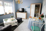 Appartement in Haffkrug - Muschelsucher Kapit&auml;n-Suite - Wohn- und E&szlig;zimmer in Kapit&auml;n-Suite