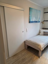 Ferienwohnung in Gr&ouml;mitz - Haus Solymar - Schlafzimmer mit Schiebet&uuml;r