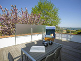 Ferienwohnung in Garz - Ferienwohnung - R&uuml;genbrise mit Seeblick mit 3 B&auml;dern, Steg und Paddelboot - alle inklusive - Bild 1